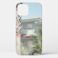 PALM TREE NEAR WHITE CONCRETE HOUSE