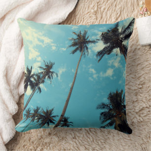 Palm trees and the sky throw pillow