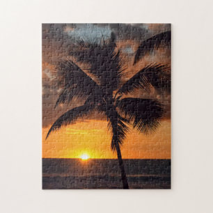 Palmier au coucher du soleil dans le puzzle d'île