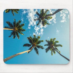 Palms on blue sky skateboard mouse pad