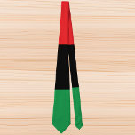 Pan-African Flag Kwanzaa Tie<br><div class="desc">Introducing the Pan-African Flag Kwanzaa Necktie – a symbol of unity, heritage, and celebration. This exquisitely crafted necktie beautifully incorporates the vibrant colors of the Pan-African flag, echoing the rich history and diverse cultures of the African diaspora. The tie features bold horizontal stripes of red, black, and green – each...</div>