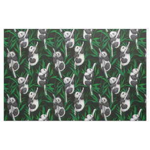 Panda cubs on dark green fabric