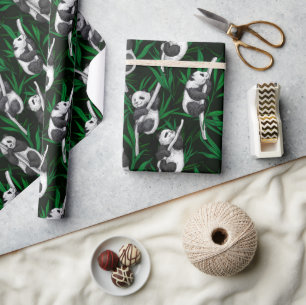 Panda cubs on dark green wrapping paper