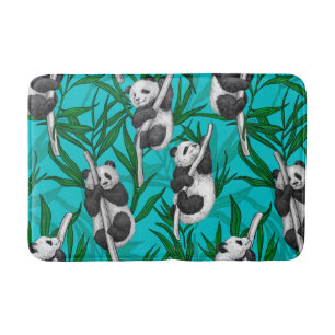 Panda cubs on turquoise bath mat