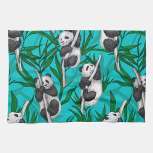 Panda cubs on turquoise kitchen towel