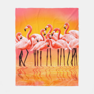 Panorama of pink flamingos on a bright pink backgr fleece blanket