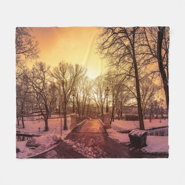 Panoramic view of snowy park during sunset in Riga Fleece Blanket (Front (Horizontal))