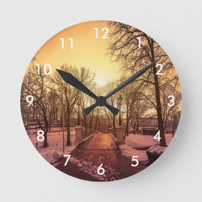 Panoramic view of snowy park during sunset in Riga Round Clock (Front)