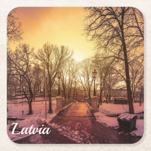 Panoramic view of snowy park during sunset square paper coaster