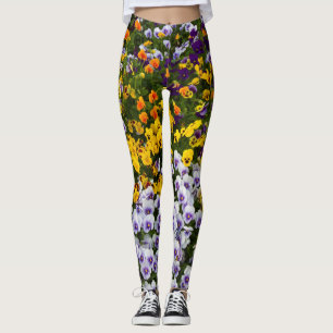 pansies in the garden. Natural image Leggings