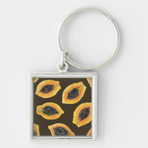 Papaya slices on dark brown keychain