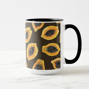 Papaya slices on dark brown mug