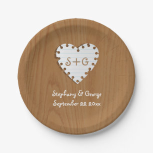 Paper heart on wood with monogram wedding plate