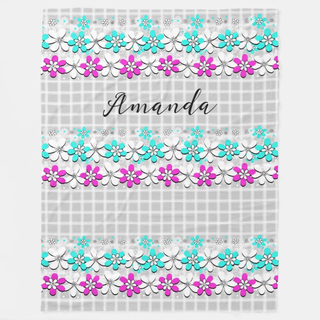 Paper neon flowers on a grey-white chequered  fleece blanket (Front)