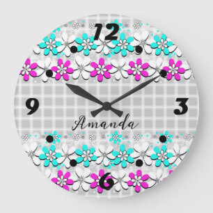 Paper neon flowers on a grey-white chequered  large clock