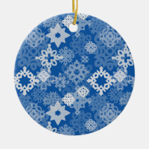Paper snowflakes and stars on indigo background ceramic ornament