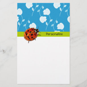 Papeterie Coccinelle florale bleue à la mode avec le nom