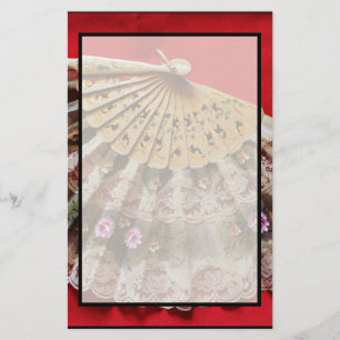Papeterie Ornate Hand Held Fan on a Red Background