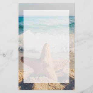 Papeterie Starfish sur une plage de sable Photo