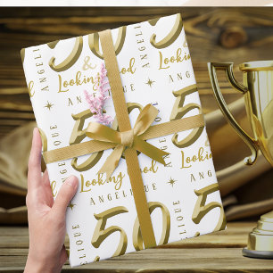 Papier Cadeau 50 et l'apparence bon or anniversaire