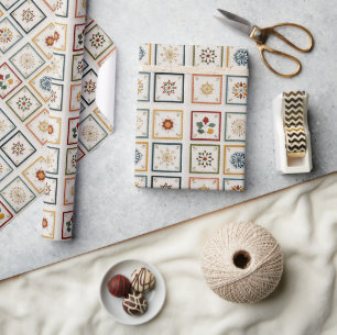 Papier Cadeau Blocs hivernaux cosy avec motifs de fêtes