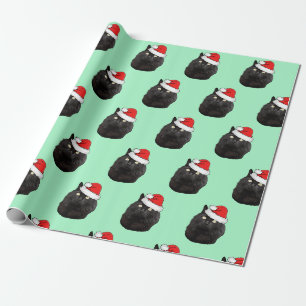 Papier Cadeau Chat noir portant un chapeau de Père Noël