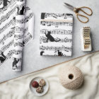 Chats noirs sur feuille de musique