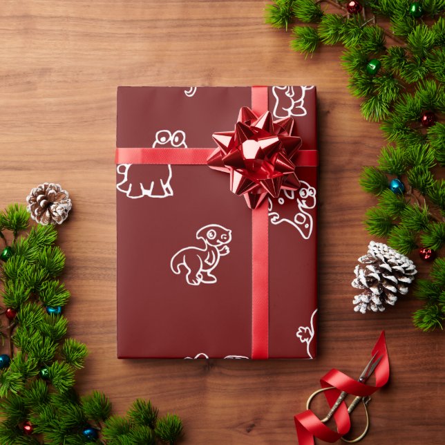 Papier Cadeau Dinos de dessin blanc jouant sur le rouge foncé (Cadeau de vacances)