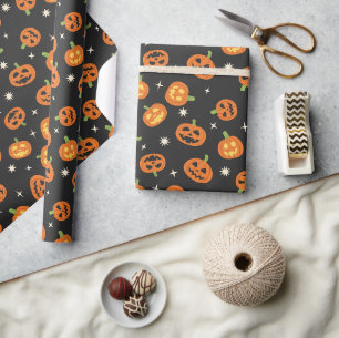 Papier Cadeau Mignons citrouilles de Halloween dispersées sur fo