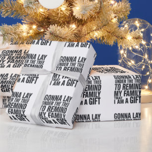 Papier Cadeau Noël va être sous l'arbre de Noël en famille 