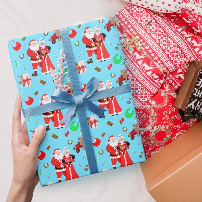 Papier Cadeau Oh Baby Père Noël & Mme Claus Baby shower Blue (
Embrace holiday magic with Santa & Mrs. Claus Baby Shower Wrapping Paper. )