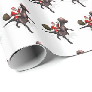 Papier Cadeau Père Noël chevauchant un Pachyosaurus
