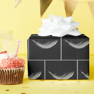 Papier Cadeau Plume blanche flottante sur fond noir