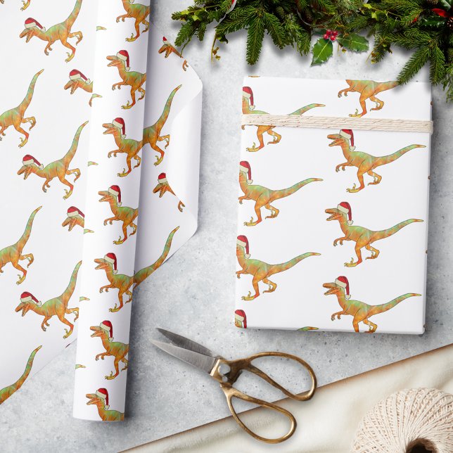 Papier Cadeau Rapporteure de dinosaures de Noël (Christmas dinosaur velociraptor wearing a santa hat pattern holiday wrapping paper festive raptor )