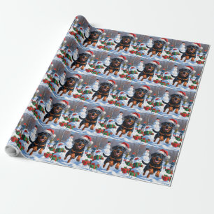 Papier Cadeau Rottweiler courant dans la neige avec un chapeau d