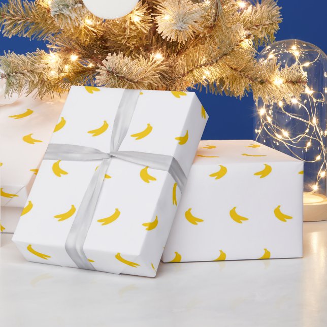Papier Cadeau Silhouettes de petites bananes jaunes sur blanc (Vacances)