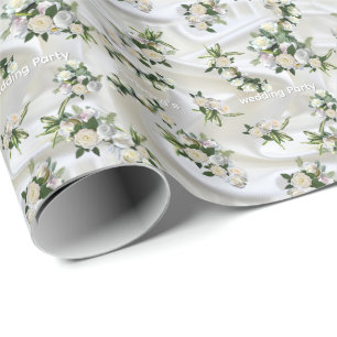Papier Cadeau Soie blanche luxueuse et fluide et roses blanches.