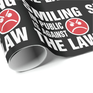 Papier Cadeau Sourire en public est contre la loi