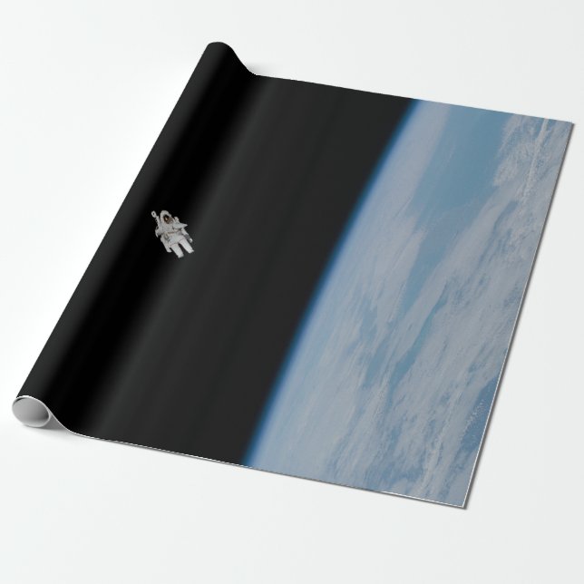 Papier Cadeau Spacewalking d'astronaute au-dessus de la terre (Déroulé)