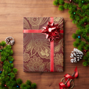 Papier Cadeau Tons dorés motif paisley orné sur fond rouge