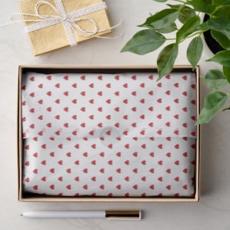 Papier de soie blanc avec coeurs rouges