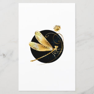 Papier libellule d'or en cercle noir