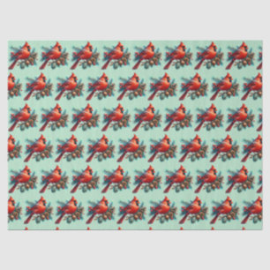 Papier Mousseline Cardinal sur la branche des pins avec les baies d'