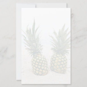 Papier Photo de 2 ananas sur une plage