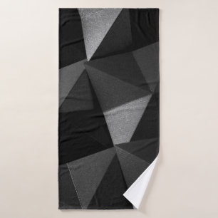 Papier texturé plié noir origami brillant abstrait