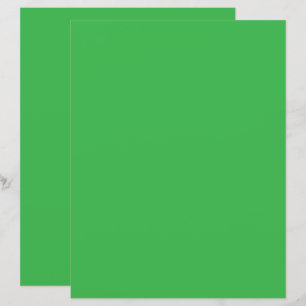 Papier un arrière - plan vert avec une bordure blanche