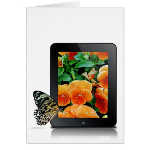 Papillon d'anniversaire sur tablette électronique