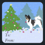 Papillon Dog Decorating Christmas Tree in Forest Square Sticker<br><div class="desc">Papillon dog breed Christmas design. This silhouette can also represent: Papillon,  Chihuahua,  Long-haired Chihuahua,  Chi,  Butterfly Dog,  Toy Fox Terrier,  Brazilian Terrier,  Squirrel Dog,  Continental Toy Spaniel,  Dwarf Spaniel,  Pap,  Russian Toy Terrier,  Russian Terrier,  Moscow Toy Terrier,  Moscovian Miniature Terrier,  Russkiy Toy</div>
