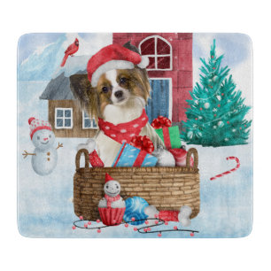 Papillon Dog In snow Christmas Dog House Cutting Board