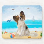 Papillon Dog on Beach Mouse Pad<br><div class="desc">Cute dog sitting on beach is a perfect gift idea for someone who love this dog breed.</div>